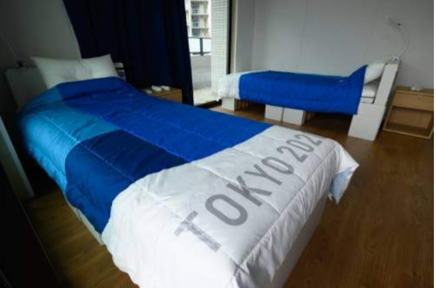 This file photo taken on June 20 shows recyclable cardboard beds and mattresses for athletes during a media tour at the Olympic and Paralympic Village. (Photo: AFP)