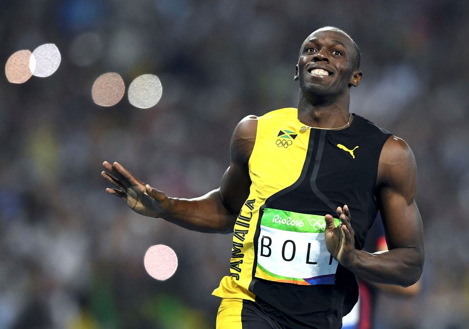Usain Bolt (JAM) of Jamaica celebrates as he crosses the finish line to win the Men's 100m Final race in Rio de Janeiro, Brazil 14/08/2016. (REUTERS/Dylan Martinez)