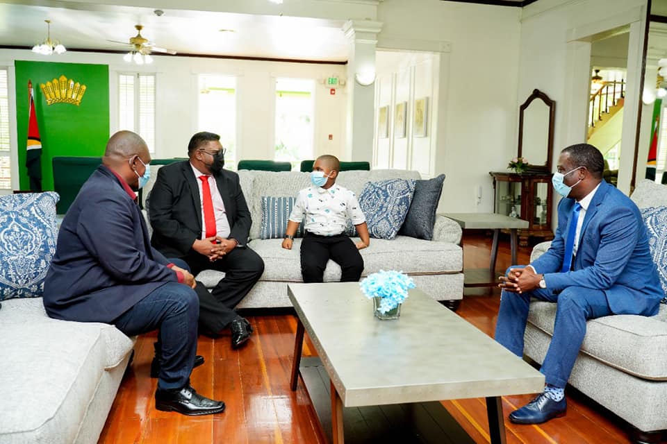 Young Randy Emmanuel Junior Shepherd in discussion with Dr. Irfaan Ali and Foreign Affairs and International Cooperation Minister, Hugh Todd on Thursday (Office of the President photo)