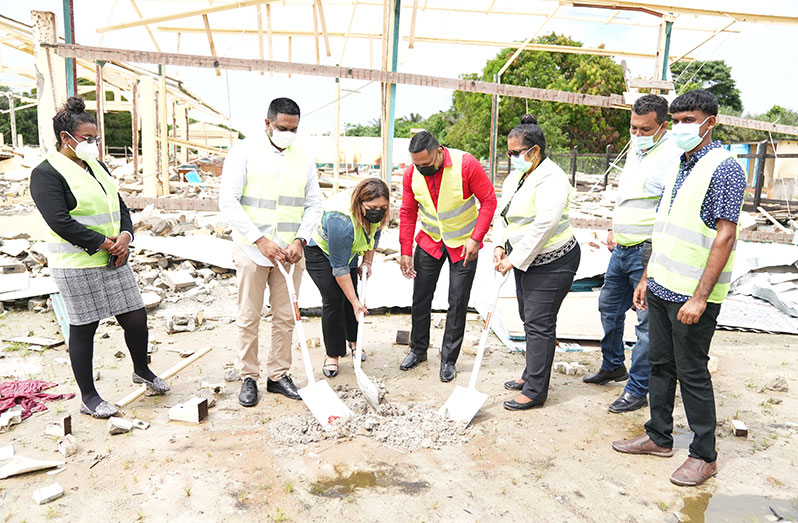 Education Minister, Priya Manickchand, and Local Government and Regional Development Minister, Nigel Dharamlall, turn the sod for the construction of the new Abrams Zuil Secondary School as Natural Resources Minister, Vickram Bharrat and others look on