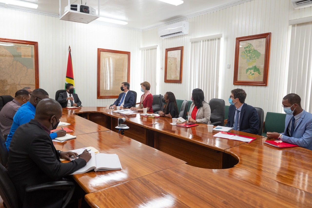 Senior Minister in the Office of the President with responsibility for Finance, Dr. Ashni Singh, engages World Bank Vice-President responsible for the Latin American and Caribbean Region, Carlos Felipe Jaramillo and other members of the World Bank delegation, on Tuesday
