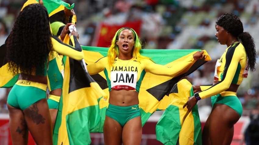 Briana Williams poses with the Jamaican flag