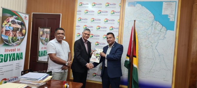 Shortly after signing the MoU for a US$35M agro-processing plant at Enmore, are, from left: Agriculture Minister, Zulfikar Mustapha, along with Maurice R. Gajadhar, CEO of Caribbean International Distributors Inc., and Go-Invest’s CEO, Dr. Peter Ramsaroop (DPI photo)