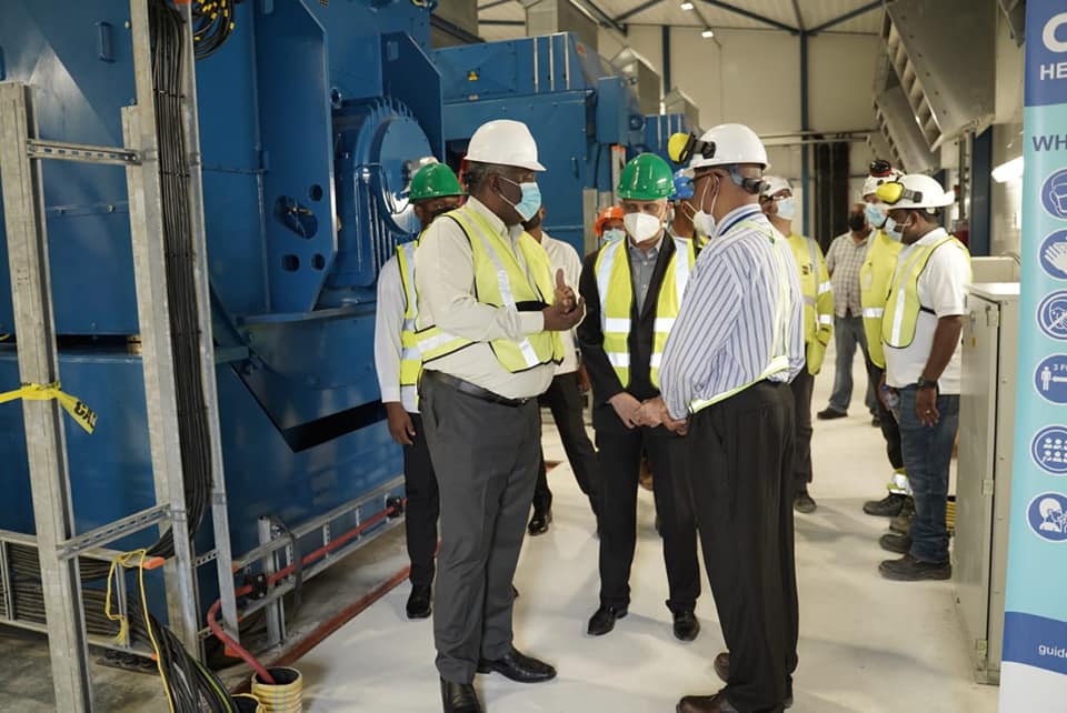 Prime Minister, Brigadier (Ret’d) Mark Phillips engages CEO of GPL, Bharrat Dindyal and his team at the Garden of Eden, East Bank Demerara, powerplant (Office of the Prime Minister photo)