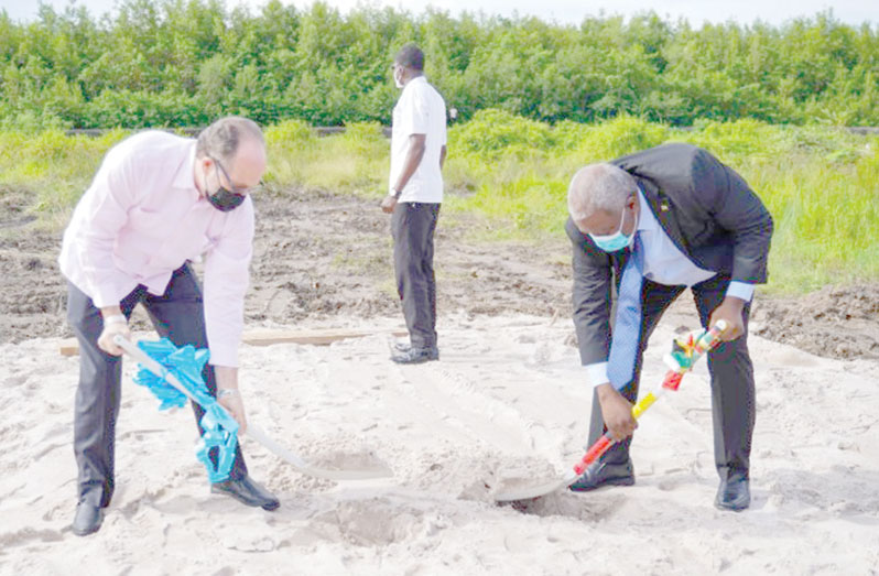 Prime Minister, Brigadier (ret’d) Mark Phillips and CARICOM Secretary-General, Ambassador Irwin LaRocque turn the sod for the construction of a new building to be used as the residence of the CARICOM Secretary-General (DPI photo)