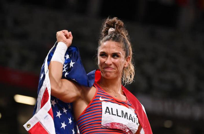 American Valarie Allman celebrates after winning Olympic gold in the women’s discus.