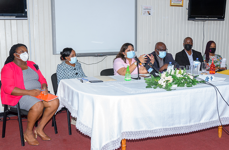 Education Minister, Priya Manickchand (third left), during a media briefing, at the National Centre for Educational Resource Development, on Friday. She was accompanied by top managers of the Ministry of Education (Delano Williams photo)
