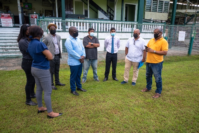 Acting Minister of Culture, Youth and Sport, Kwame McCoy and team conducting an assessment at the Georgetown Cricket Club (DPI photo)