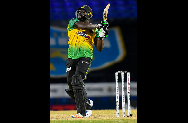 Kennar Lewis of Jamaica Tallawahs hits a six during the 2021 Hero Caribbean Premier League match 10 between Barbados Royals and Jamaica Tallawahs at Warner Park Sporting Complex on August 31, 2021 in Basseterre, St Kitts, Saint Kitts and Nevis. (Photo by Randy Brooks - CPL T20/Getty Images)