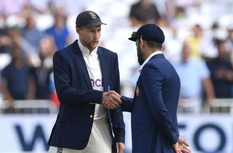 Joe Root and Virat Kohli. (Photo by Stu Forster/Getty Images)