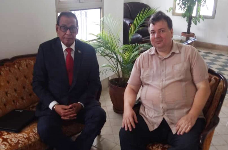 Hungarian Charge d’Affaires in Cuba, Zsolt Kiraly (right) with Guyana’s Ambassador, Halim Majeed