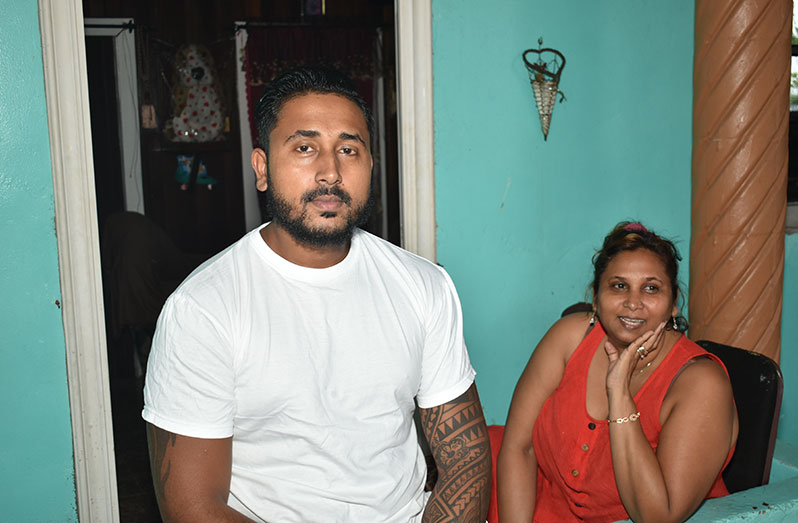 Sattie Mahadeo and her son, Sanjeev Mahadeo at their home in Coghlan Dam (Carl Croker photos)