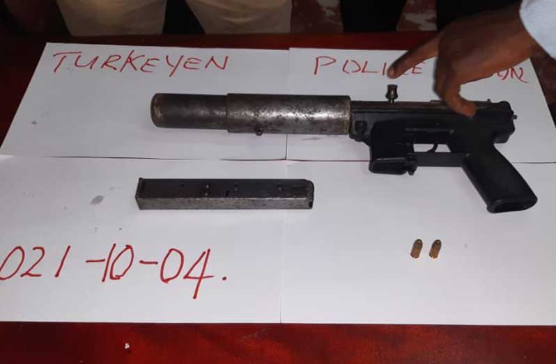 The Beretta handgun, the one magazine and two live 9MM rounds that were found by police