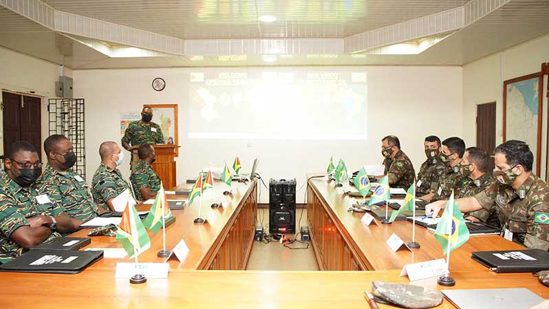 (At podium) Colonel Trevor Bowman commenced discussions at the 24th Regional Meeting of Military Exchange