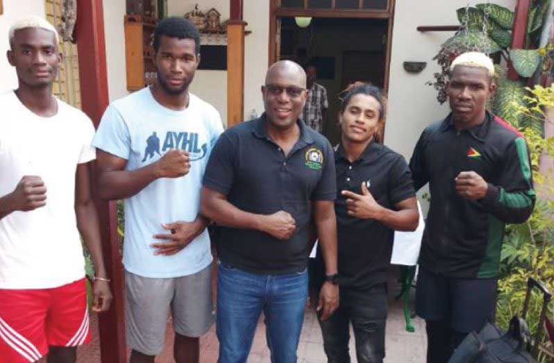 FLASHBACK:  GBA president Steve Ninvalle (centre), along with boxers (from left) Colin Lewis, Dennis Thomas, Keevin Allicock and Desmond Amsterdam.