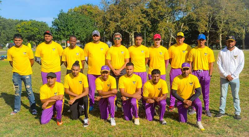 Phoenix Cricket Club players with club president Sharma Sukhdeo