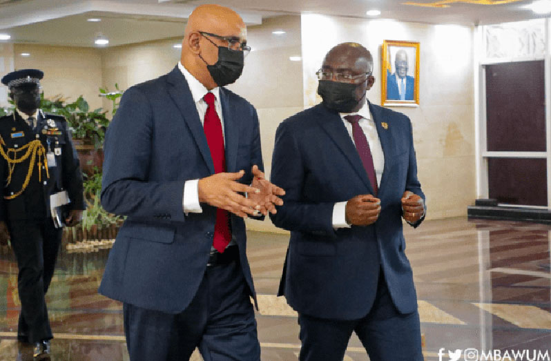 Vice-President Bharrat Jagdeo interacts with Vice-President of Ghana, Dr Mahamudu Bawumia (3news.com photo)