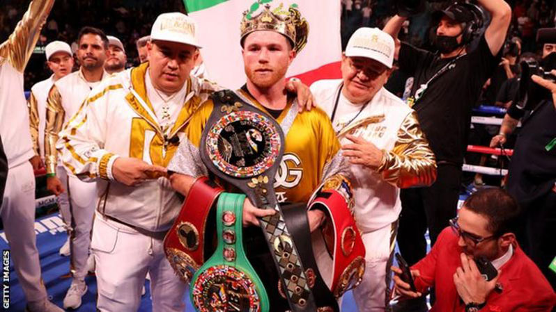 Saul `Canelo’ Alvarez poses with all four of his belts