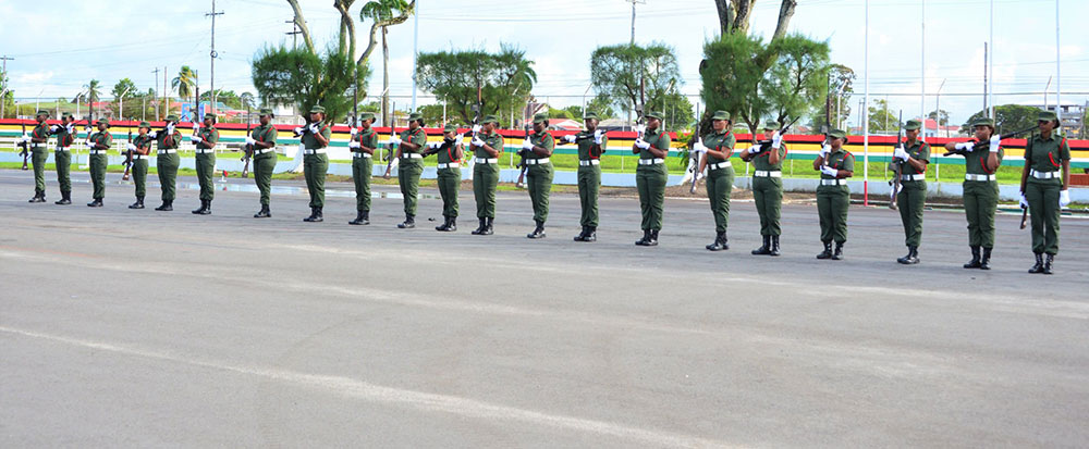 The female team during their execution of a rifle drill