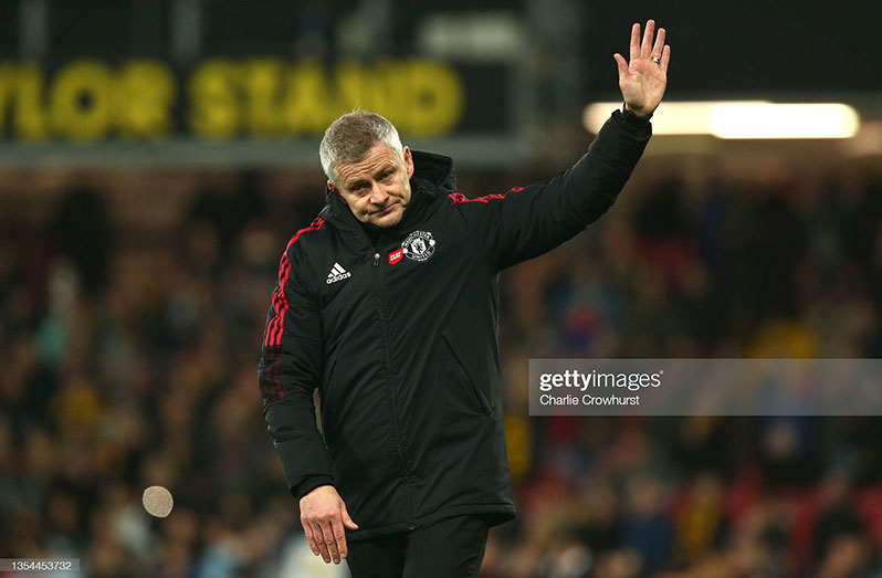 Ole Gunnar Solskjaer, Manager of Manchester United acknowledges the fans following the Premier League match between Watford and Manchester United at Vicarage Road on November 20, 2021 in Watford, England (Photo by Charlie Crowhurst/Getty Images)