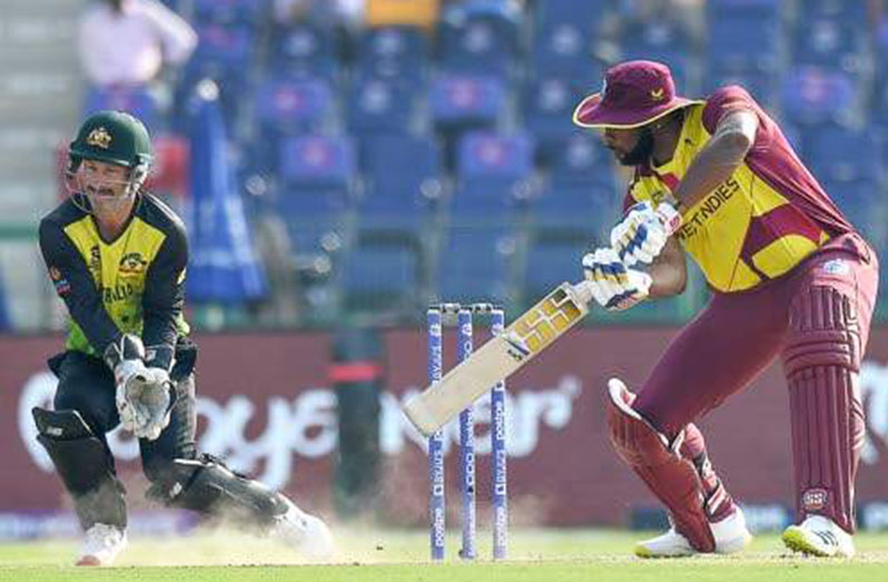 West Indies’ Kieron Pollard (right) plays a shot during the ICC men’s Twenty20 World Cup cricket match between Australia and West Indies at the Sheikh Zayed Cricket Stadium in Abu Dhabi on Saturday.