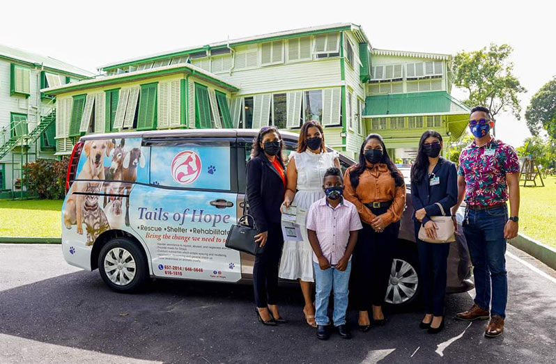 Members of Tails of Hope received a vehicle to aid with their work from the Office of the First Lady