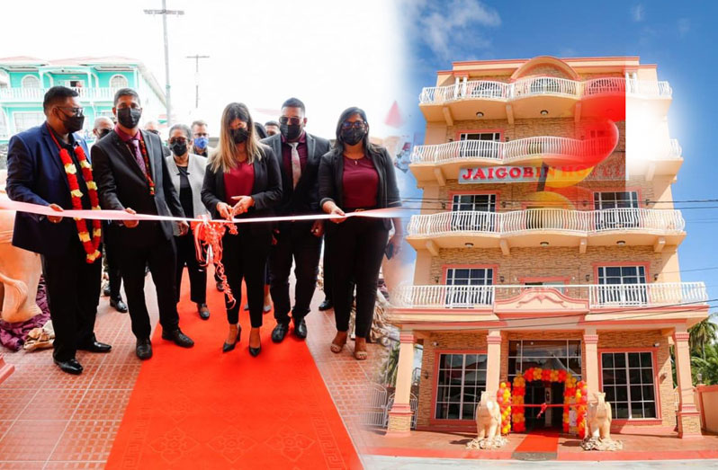 President Dr. Irfaan Ali and other stakeholders cut the ceremonial ribbon to officially declare open the new Jaigobin Hotel at Henrietta, on the Essequibo Coast (Office of the President photos)
