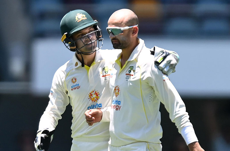 Wicketkeeper Alex Carey enjoyed a record-breaking debut in the first Test at The Gabba to earn
praise from Nathan Lyon.