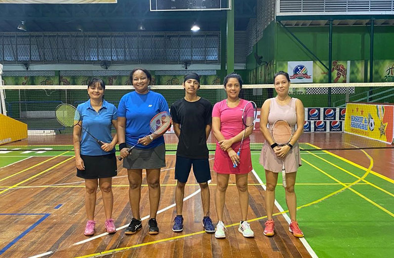 Emelia Ramdhani (left) and Ayanna Watson (second from left) were defeated by Christina Kumar and Anna Perreira in the Women’s Doubles semi-finals.  Also in the photo is umpire Matthew Beharry (middle)