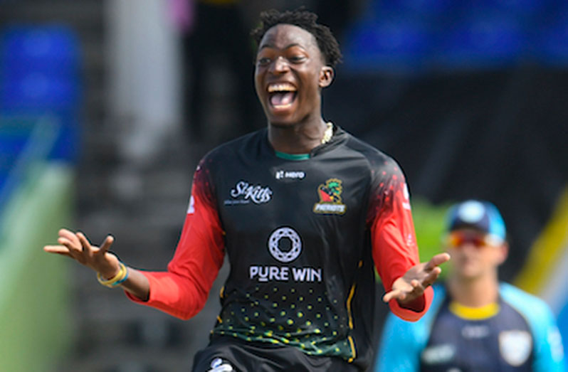 Dominic Drakes celebrates after leading St Kitts and Nevis to victory in the CPL final.