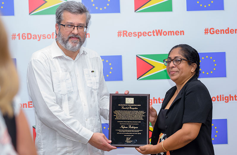 Nafeeza Rodrigues receiving her award from European Union Ambassador, His Excellency Fernando Ponz Cantó (Delano Williams Photos)