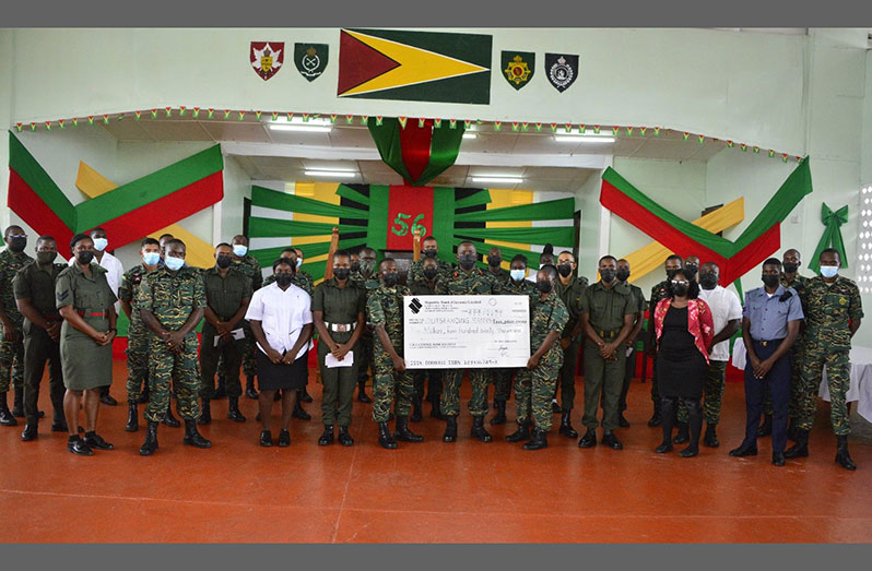 Chief-of-Staff Brigadier Godfrey Bess (centre) flanked by the incentive recipients from the various units