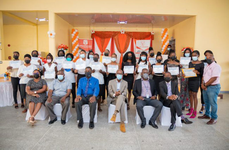 Persons from Region Three who graduated from BIT programmes along with officials of the Ministry of Labour