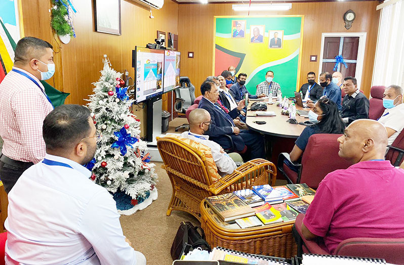 A 17-member team of investors from Suriname meeting with Chief Executive Officer of the Guyana Office for Investment (Go-Invest), Dr. Peter Ramsaroop, at his Camp Street Office, last November