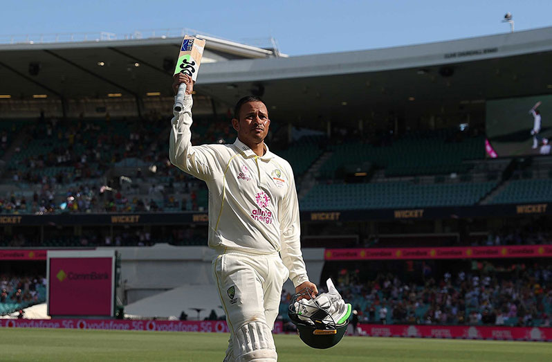 Usman Khawaja celebrated a century in each innings of his comeback Test to lift Australia from early trouble