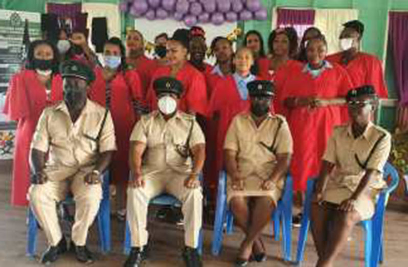 Senior prison officers with some of the inmates