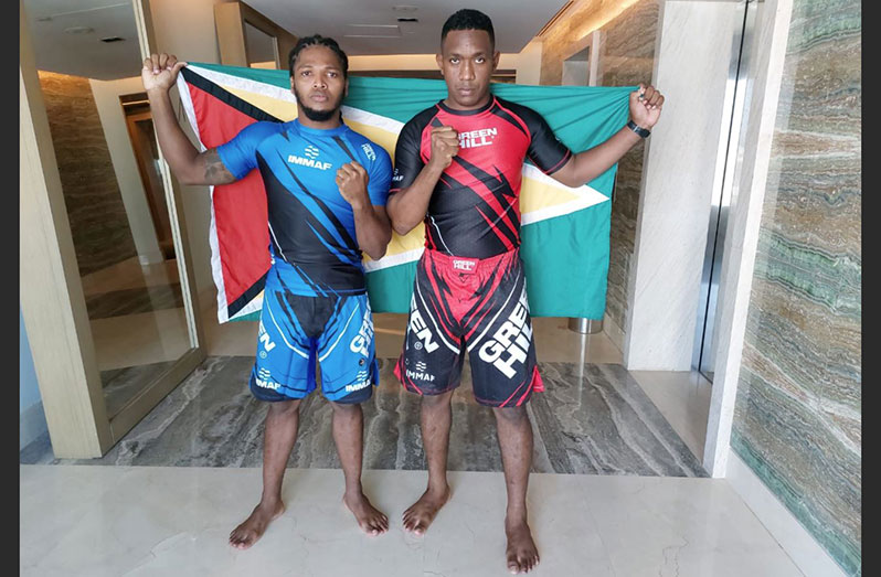 We’re Ready! Corwin D’Anjou (L) and Ijaz Cave dressed in their battle gear and are ready to carry the Golden Arrowhead into the ‘Octagon’ for the first time at the IMMAF World Championships. (Rawle Toney Photos)