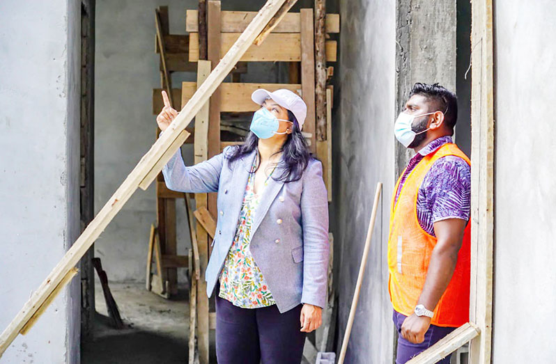 Human Services and Social Security Minister Dr Vindhya Persaud makes a point during her visit to the construction site on Friday
