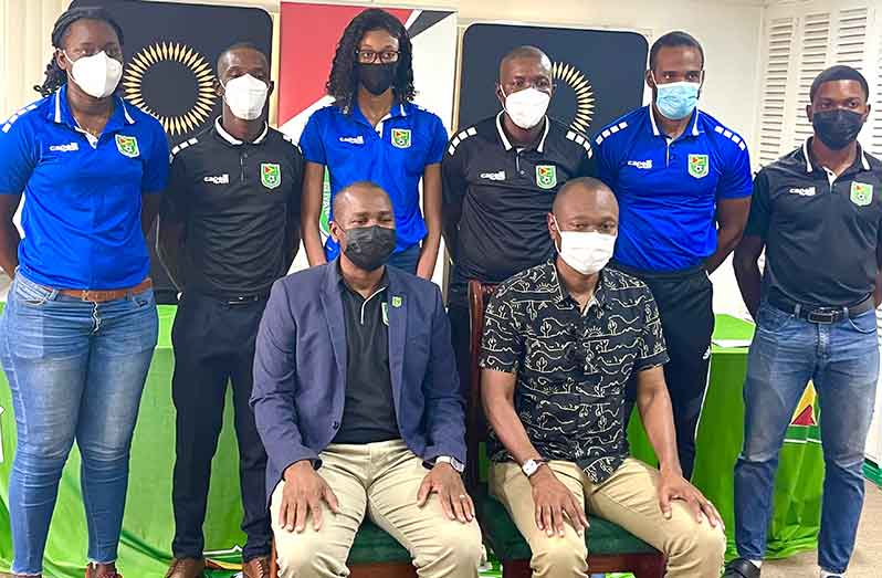 GFF President Wayne Forde and Head of Refereeing Dion Inniss honour Guyana's referees