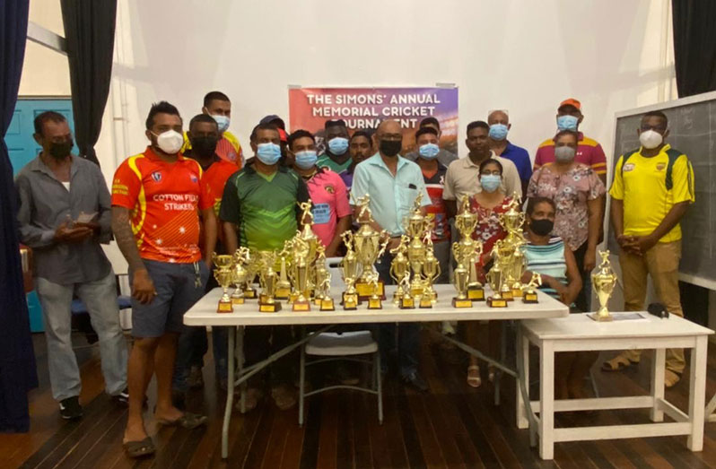 Simons family and members of the Essequibo Cricket Board at the launch