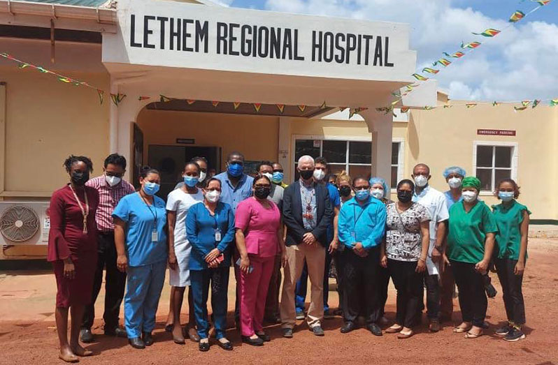 Deputy High Commissioner Ray Davidson (center) flanked by staff of the newly retrofitted Lethem Hospital
