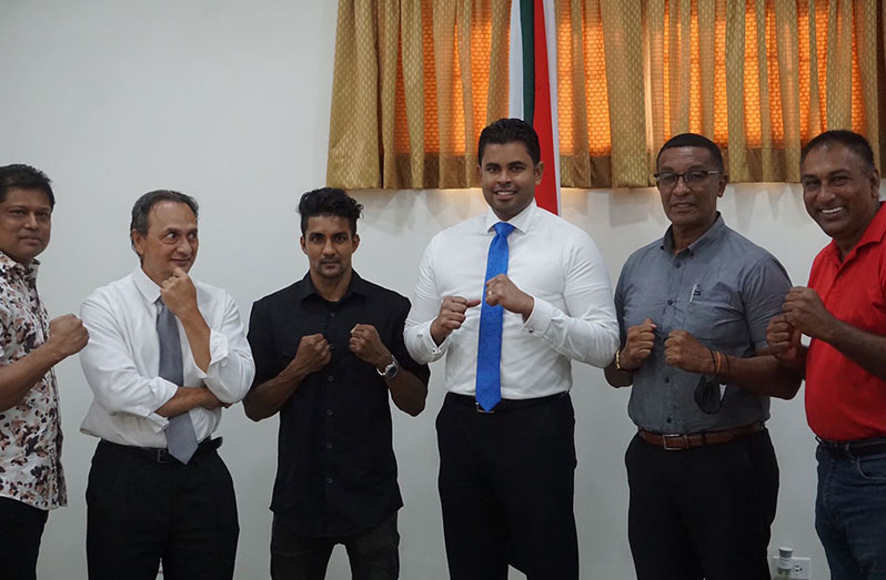 From left: Jack Bharat,  veteran boxing promoter Peter Abdool, Guyanese main-event superstar Elton Dharry, Minister of Sport Charles Ramson Jr, NSC Chairman Kashif Muhammad and co-promoter Aleem Hussain