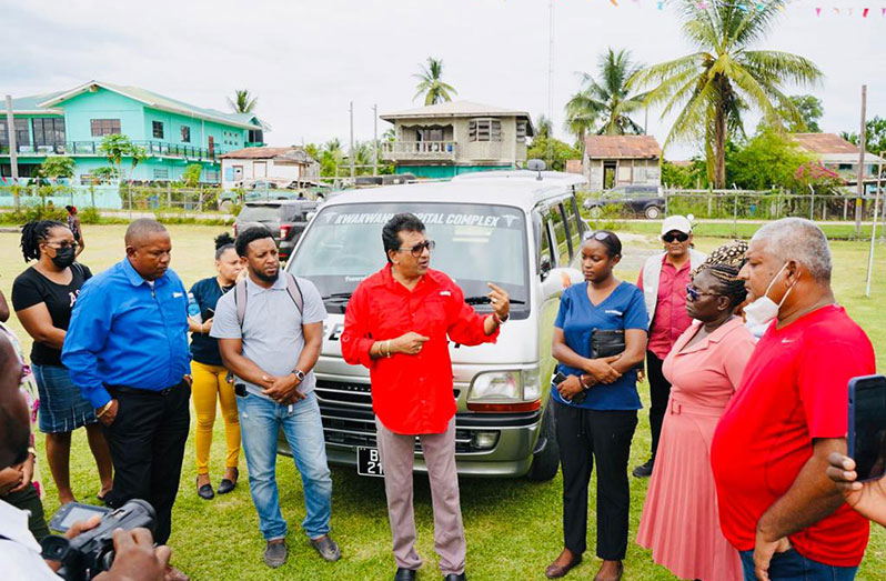 Attorney-General and Minister of Legal Affairs, Mohabir Anil Nandlall spoke with officials from the KNRO and others in attendance after the key to the ambulance was handed over at Independence Park, Kwakwani, Region 10