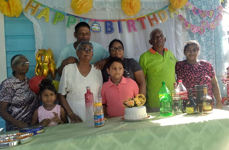 Grace Khan (extreme left) with her parents, children, and grandchildren