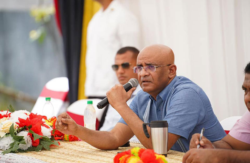 Vice-President, Dr Bharrat Jagdeo speaks to residents at the Line Path Community Centre ground on Monday (DPI photo)