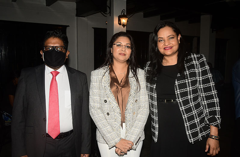 Senior Minster in the Office of the President with responsibility for Finance, Dr. Ashni Singh, and Minister of Human Services and Social Security, Dr. Vindhya Persaud, with Founder and General Manager of RNS Insurance Brokers and Consultants Inc., Ramona Singh, at the launch of the company, on Wednesday (Adrian Narine photo)