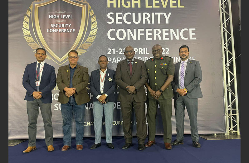 Minister of Home Affairs, Robeson Benn (third from right) is flanked by members of his team that attended the HLSC in Paramaribo, Suriname