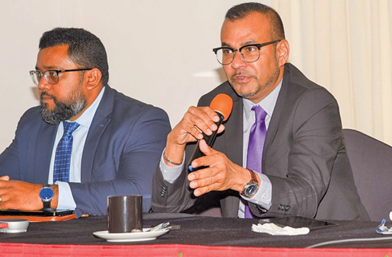 Foreign Secretary Robert Persaud addressing persons at an oil-and-gas seminar here on Thursday