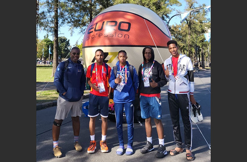 From left, Guyana’s 3X3 team co-ordinator Junior Hercules along with players Carmelo Man-son-Hing, Kimol Grimmond and Matthias Arrindell in Argentina