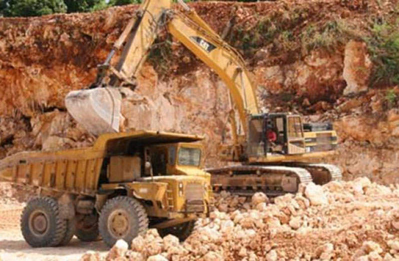 The exposed rocks will be drilled, blasted and transported by haul trucks to the crushing plant stockpile